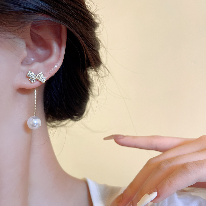 Light luxury and exquisite zircon bow earrings for women, a pair of pearl stud earrings with a unique and versatile style details Picture