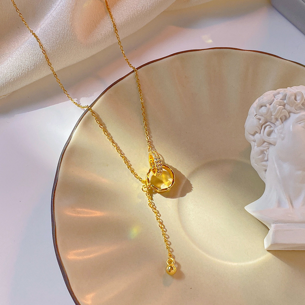 Korean InS-style golden interlocking tassel double-ring necklace, a niche and light luxury design for women, a popular collarbone chain Specification drawing
