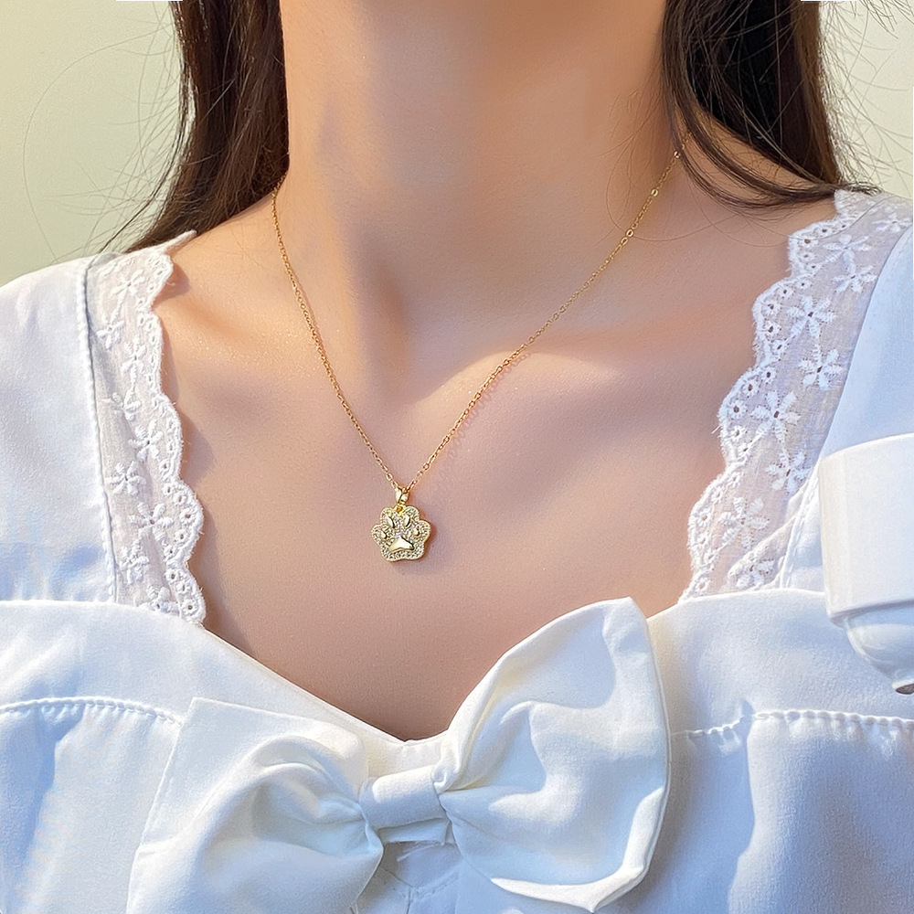 Japanese and Korean light luxury cute cat paw pendant titanium steel necklace for women, simple and versatile fashion collarbone chain, popular high-end accessory details Picture