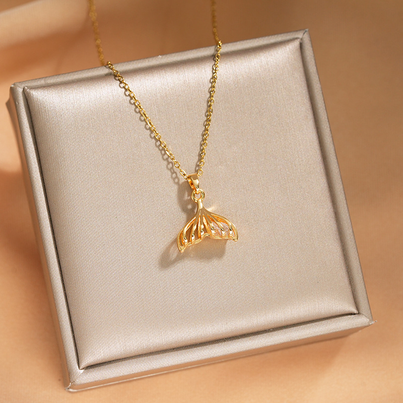 The new and fashionable hollowed-out fishtail zircon necklace exudes a feminine and high-end charm. The titanium steel collarbone chain is a simple and light luxury accessory details Picture