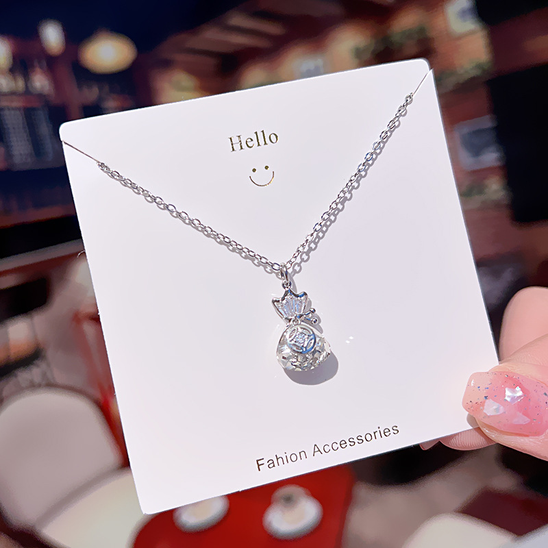 Japanese and Korean light luxury crystal "Fu" character money bag pendant titanium steel necklace, simple and versatile for women, popular collarbone chain, niche accessory Specification drawing