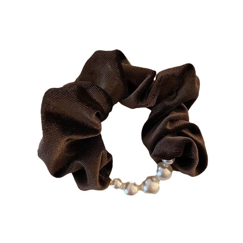 The high-end velvet bead large intestine hair band exudes an elegant feminine charm. The low ponytail hair tie is highly elastic and won't damage the hair Item Picture
