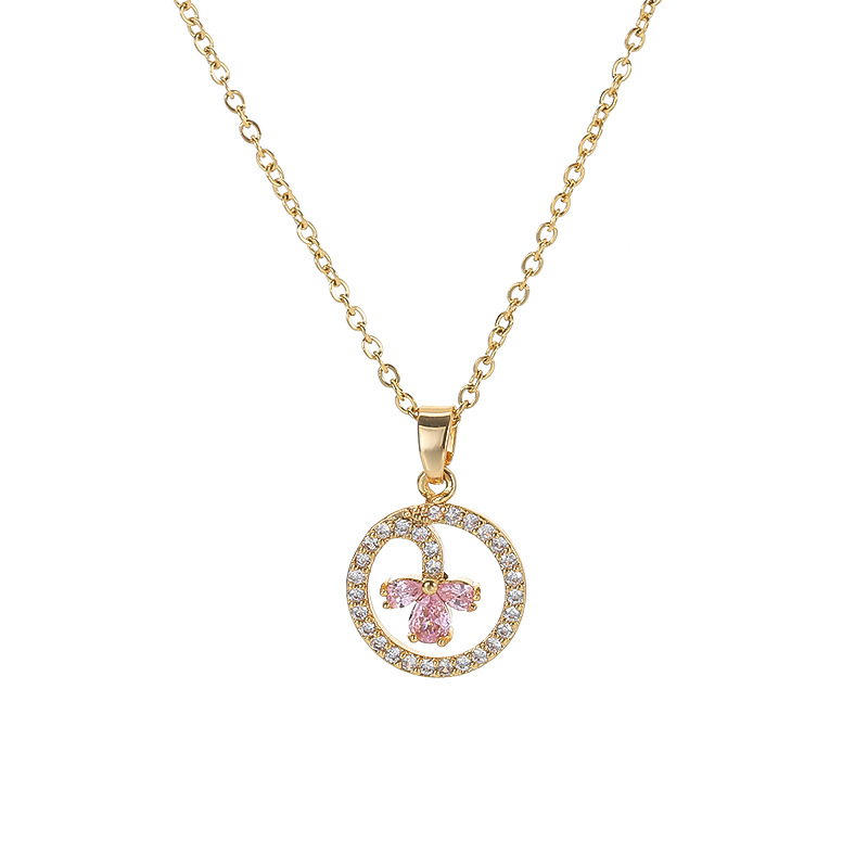 A high-end Japanese and Korean diamond-encruted round geometric titanium steel necklace with a unique and light luxury design for women, featuring an E-letter pendant accessory Item Picture