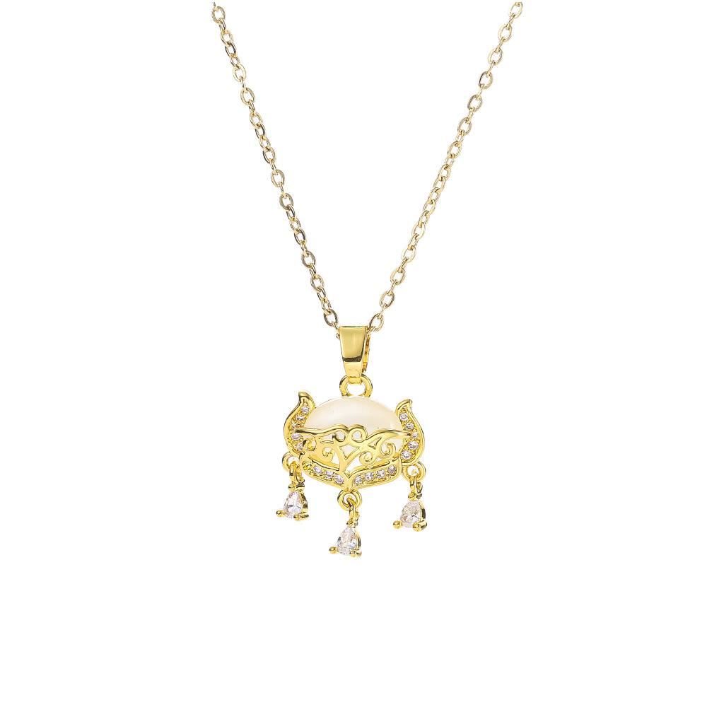 A high-end Japanese and Korean cat's eye stone fox-shaped safety lock pendant titanium steel necklace, a women's niche and light luxury tassel accessory Item Picture