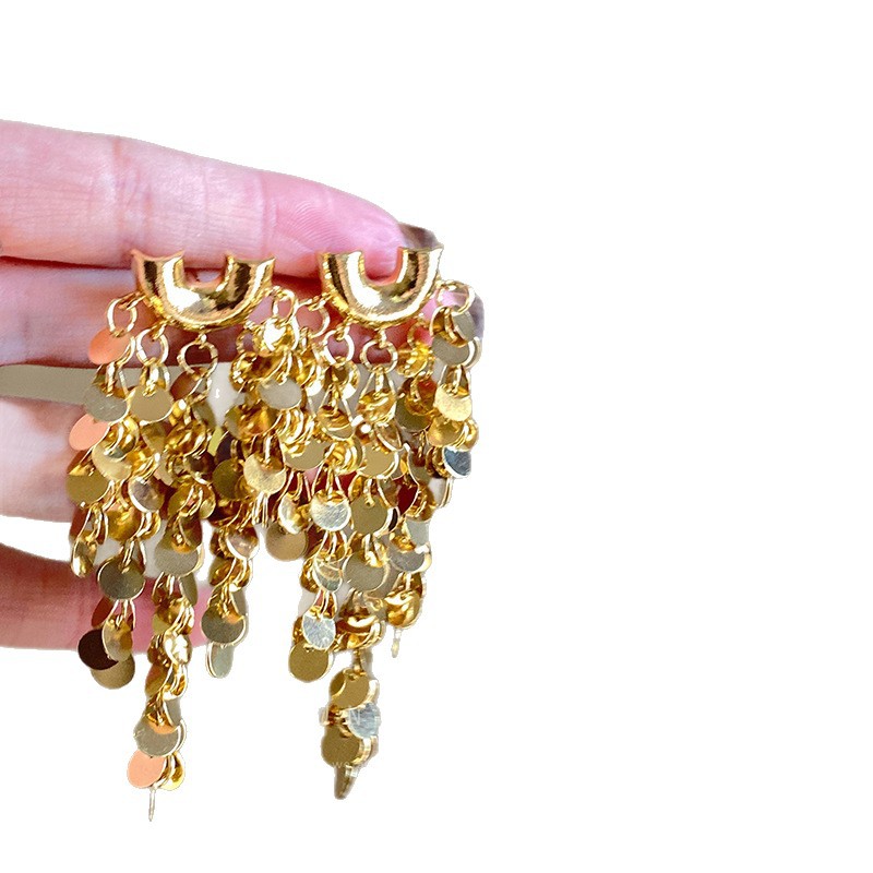 Exaggerated and high-end golden sequined tassel earrings for women, a niche and exaggerated look that makes the face look smaller, a unique Hong Kong-style metallic earpiece Item Picture