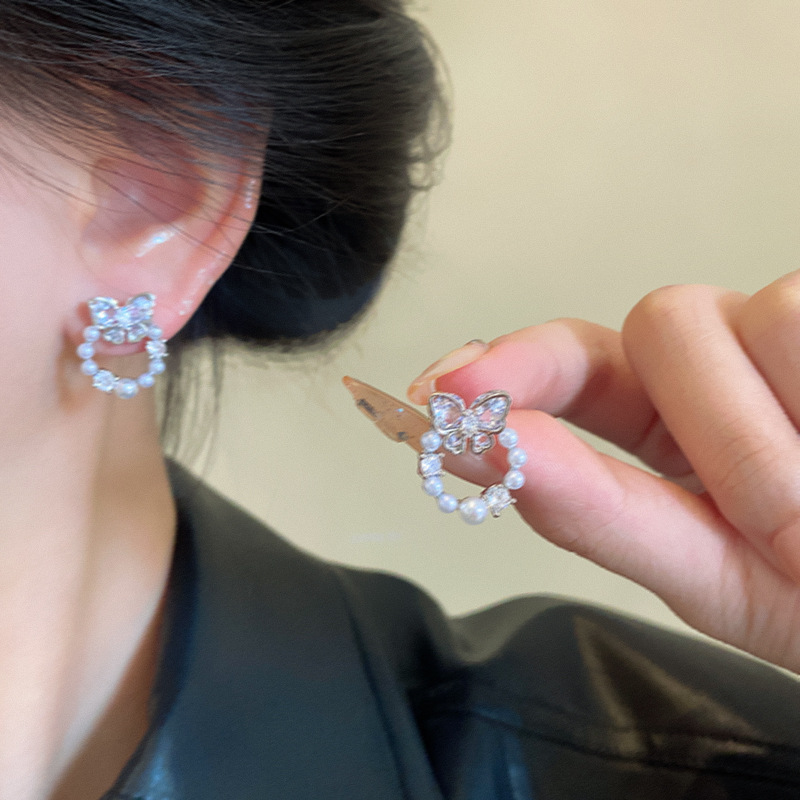 Korean diamond-encrusted butterfly pearl stud earrings for women's autumn and winter, simple and elegant, versatile earrings, sweet girl earrings wholesale details Picture