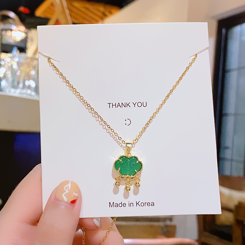 Green imitation chalcedony glass peace lock pendant titanium steel necklace women's summer light luxury high-end collarbone chain batch details Picture