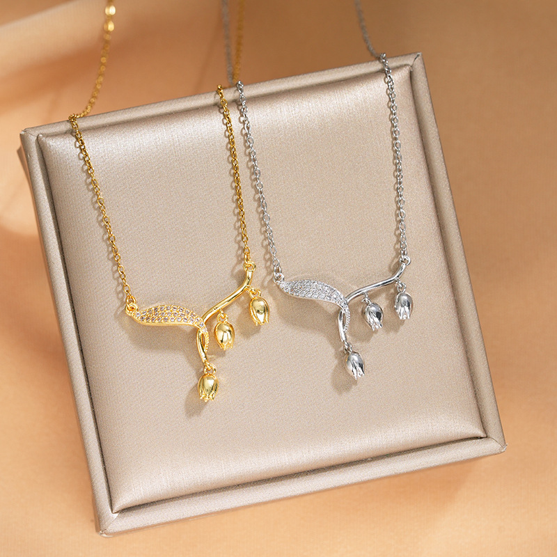 The new gold electroplated lily of the valley necklace is a fashionable and light luxury accessory for women. It is the same high-end style as the popular collarbone chain full figure