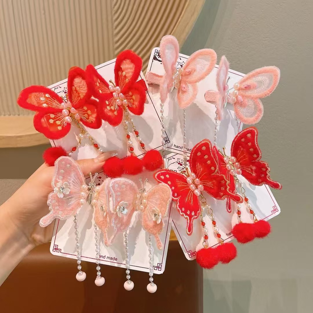 New Year's children's red bow hairpin with plush tassels on the edge, girls' festive New Year headwear details Picture