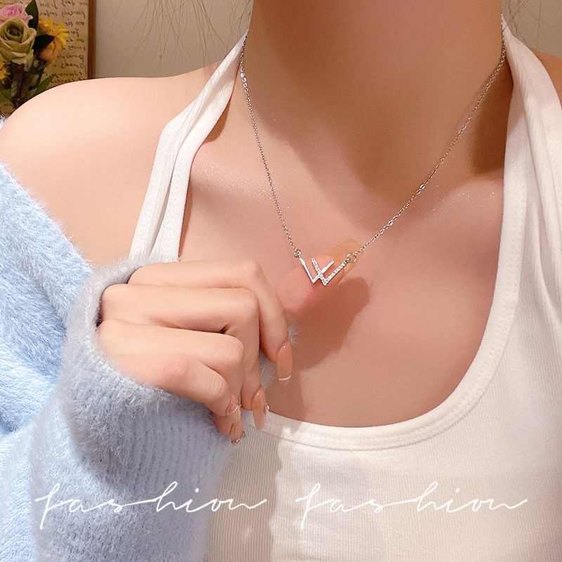 Korean version exquisite micro-inlaid titanium steel necklace for women, 2025 new light luxury letter pendant collarbone chain, Yiwu accessory Application Scenario