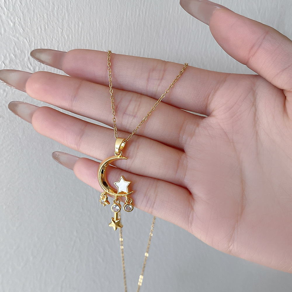 Fashionable and niche design, tassel star moon pendant titanium steel necklace, women's light luxury, versatile collarbone chain accessory details Picture