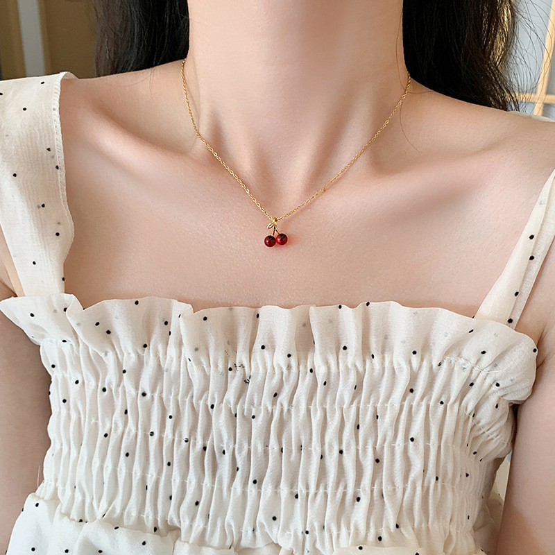 A simple and cute Japanese and Korean cherry titanium steel necklace with a new Instagram style for women, a niche Internet celebrity collarbone chain, and a versatile accessory Application Scenario