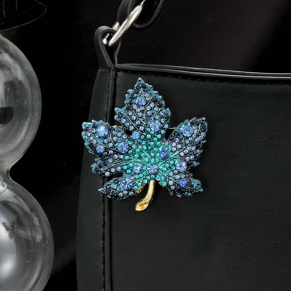 Cross-border European and American diamond-encrusted gradient red maple leaf brooch, retro design sense, exquisite and fashionable coat and suit pin Application Scenario