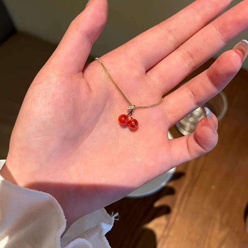 Wholesale of the new red cherry pendant necklace from South Korea, featuring a light luxury style for women, a niche charm, versatile and high-end collarbone chain details Picture