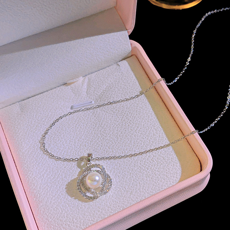 Korean style zircon pearl necklace, women's camellia full diamond collarbone chain, titanium steel high-end accessory Application Scenario