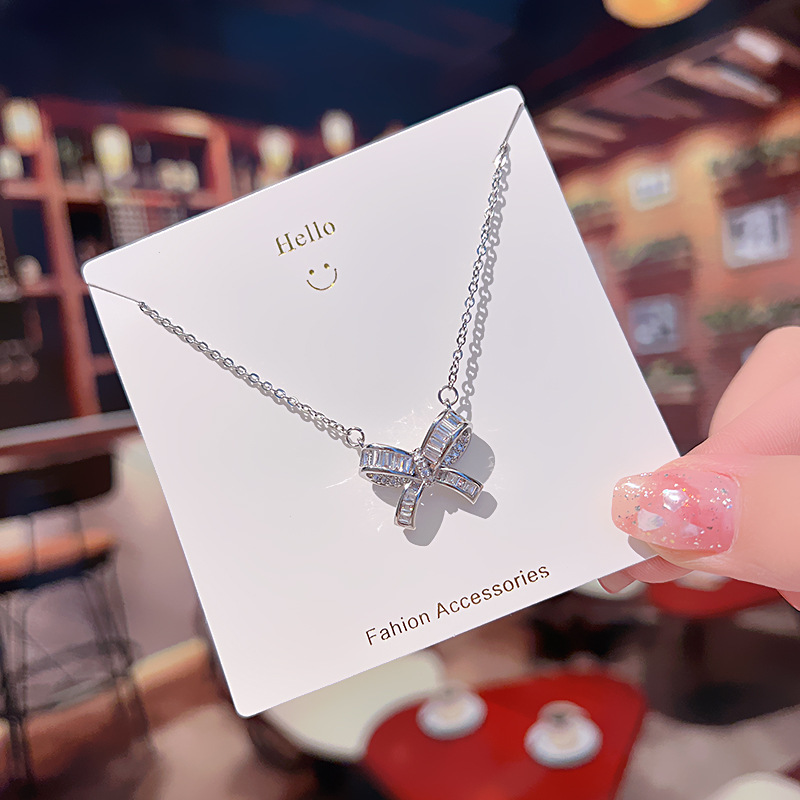 A silver bow titanium steel necklace with a Japanese and Korean design sense, a delicate zircon light luxury collarbone chain for women, and a versatile accessory for Internet celebrities Specification drawing