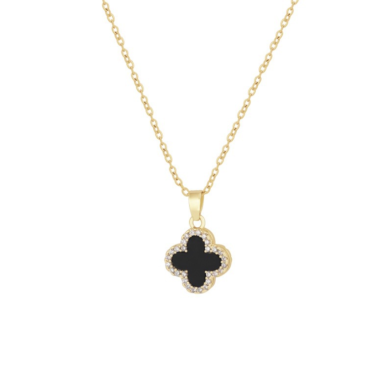 This stylish and commuting double-sided black and white four-leaf flower necklace exudes a sense of sophistication for women. It's a versatile zircon pendant and a sophisticated collarbone chain Item Picture