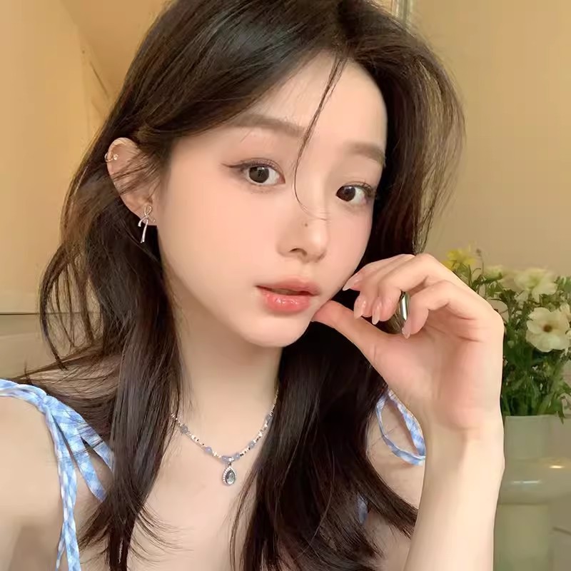 Simple ribbon bow stud earrings for women with a high-end feel, 2024 new cool style unique bestseller earrings wholesale details Picture