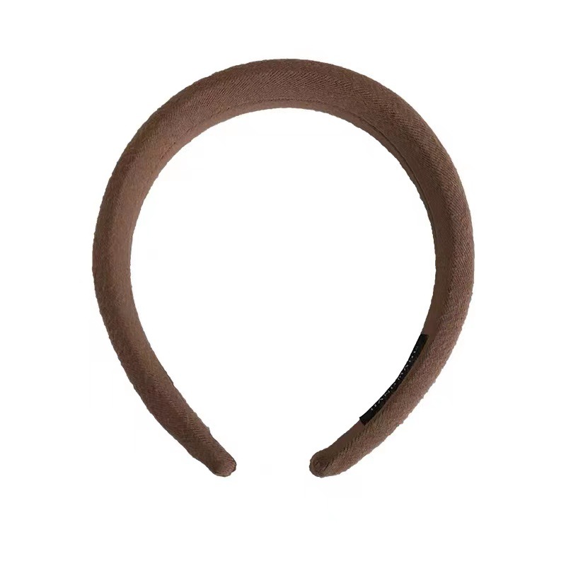 The Maillard hairband is a new high-end headwear for women, featuring a sponge hairpin in coffee color and a high top pressure on the head Item Picture