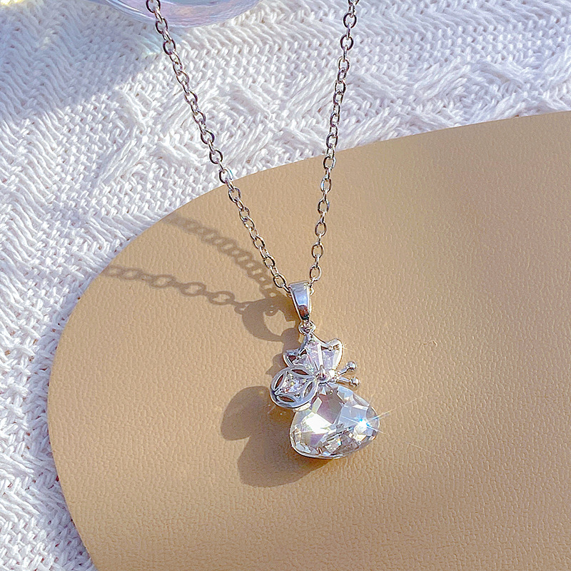 Japanese and Korean light luxury crystal "Fu" character money bag pendant titanium steel necklace, simple and versatile for women, popular collarbone chain, niche accessory details Picture