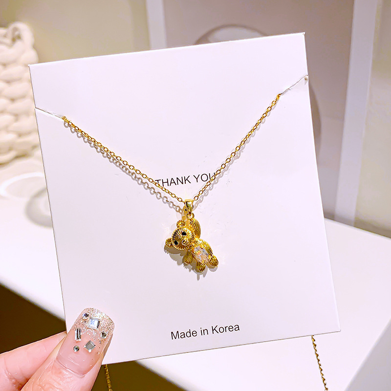 Douyin's diamond-encrusted bear titanium steel necklace, a niche design for women with a light luxury collarbone chain, is a versatile and high-end accessory Specification drawing