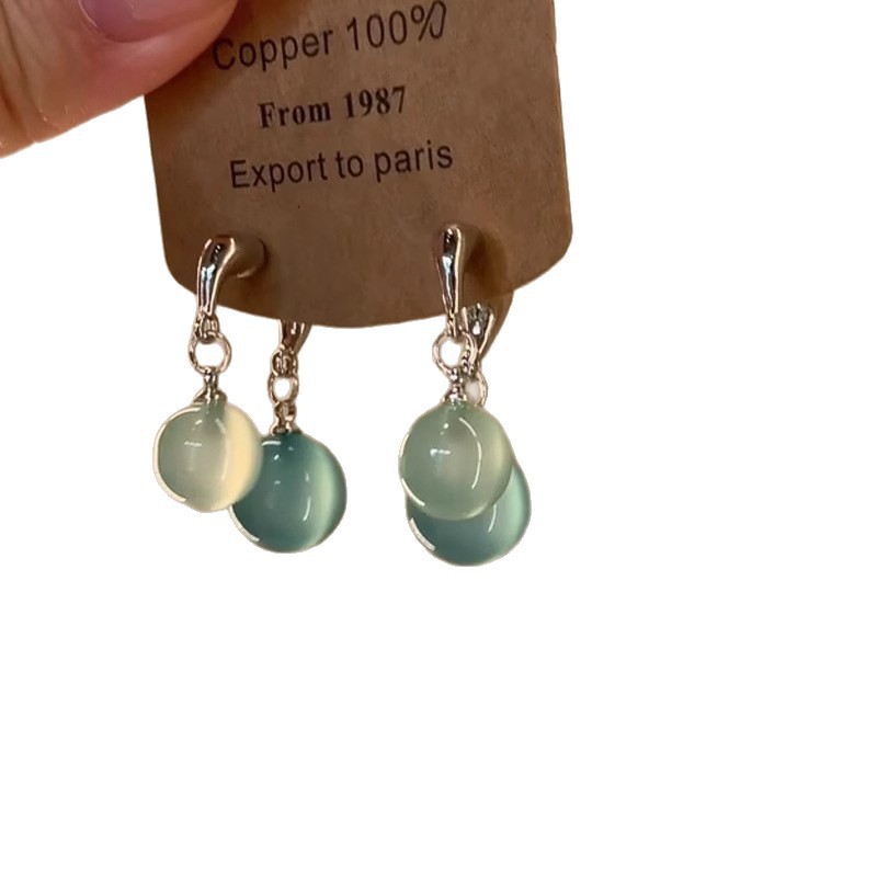 Cool summer ~ Ice-transparent round ball cross earrings, a unique 2025 new high-end and niche earring accessory for women Item Picture