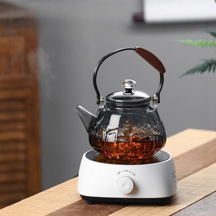 High borosilicate high-temperature resistant glass lotus handle teapot, glass steaming and boiling integrated teapot, large-capacity office brewing teapot Application Scenario