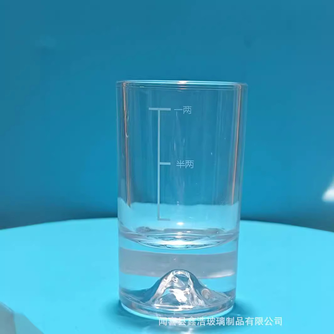 The new 1 liang 2 liang wine dispenser with ice mountain bottom crystal white material graduated white spirit cup is suitable for home, commercial, hotel and restaurant use full figure