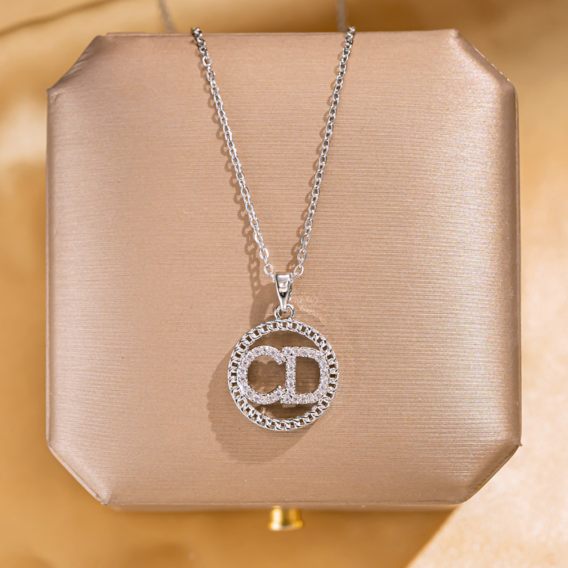 Korean InS-style letter CD circular necklace with feminine charm, full diamond titanium steel collarbone chain, retro and versatile accessories wholesale full figure