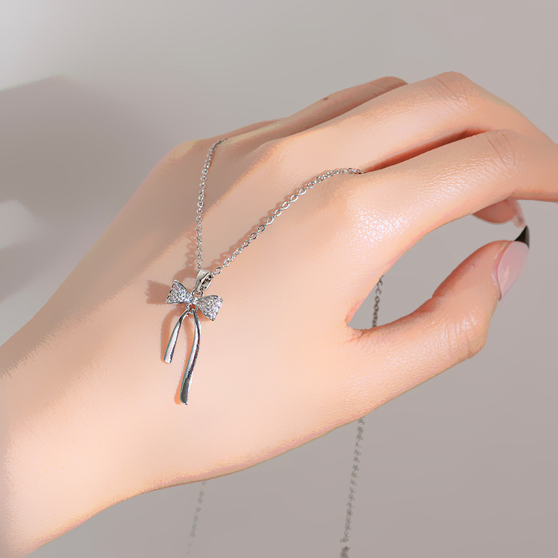 Fashionable and elegant, light luxury, full diamond bow tassel necklace for women, unique and versatile, high-end collarbone chain, silver accessory Application Scenario