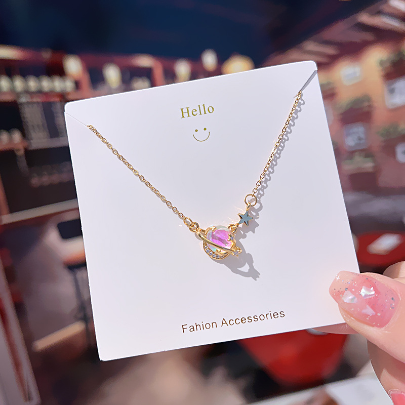 Fashionable and colorful color-changing planet titanium steel necklace, a niche design sense for women, a popular collarbone chain, a stylish and versatile accessory full figure