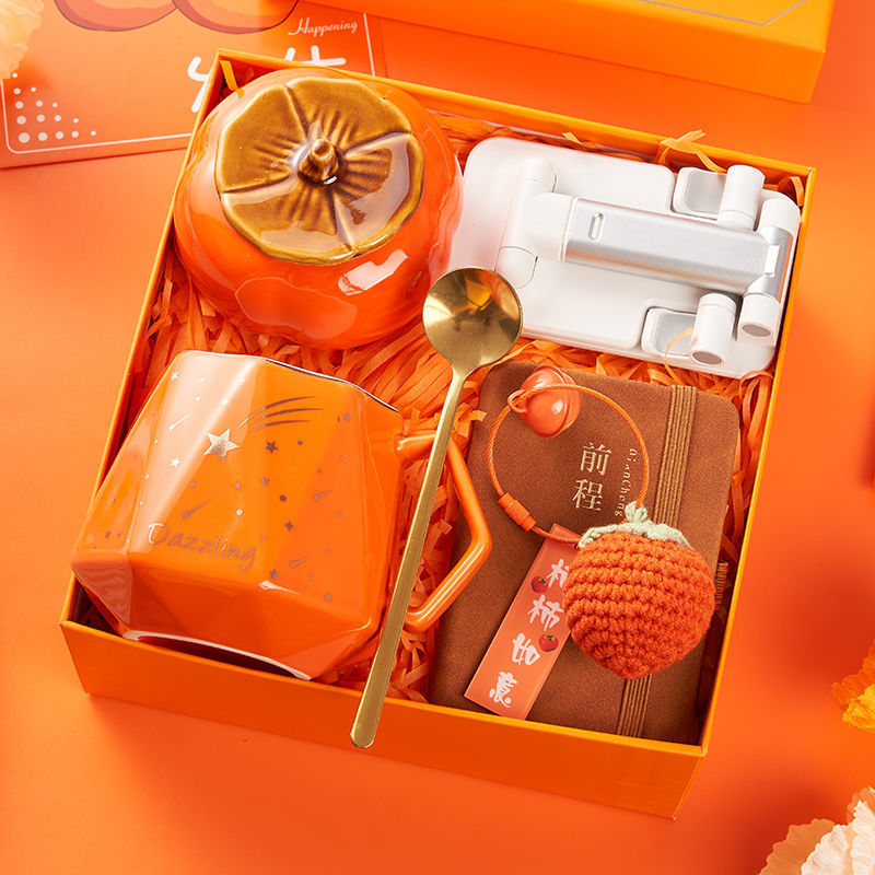 Orange souvenirs are casually given to employees for their birthdays. Practical company event, business opening and team-building small gift boxes details Picture