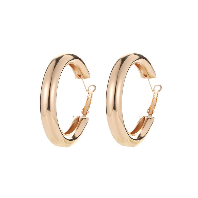 This is a versatile golden geometric round large earring for the European and American fashion OL style, featuring exaggerated Riri circle earrings for women Item Picture