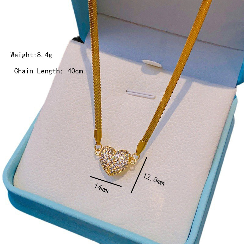 This is an openable full-diamond magnetic heart-shaped necklace with a unique and light luxury design for women. It features a blade chain heart-shaped pendant as a light luxury accessory Item Picture