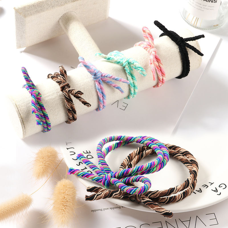 Korean style simple and fresh hair rope and hair accessory, basic 8-strand braid, leather band, 2-yuan store, factory direct batch, knotted full figure