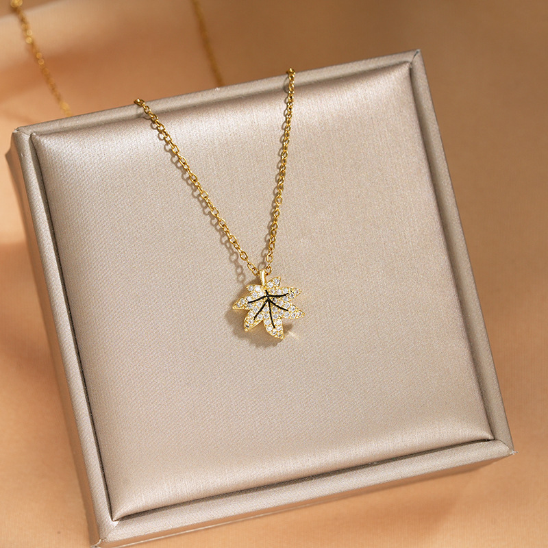 The same exquisite zircon maple leaf pendant titanium steel necklace as on Xiaohongshu, a fashionable, simple and elegant collarbone chain accessory for women details Picture
