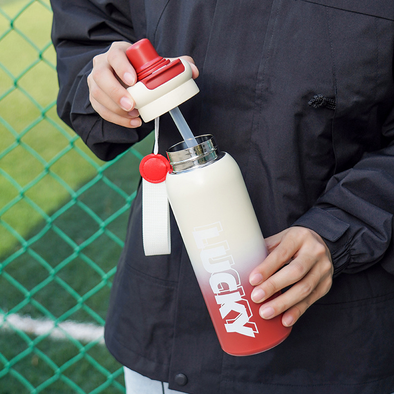 Simple letter outdoor sports insulated cup, 316L stainless steel student double-drinking cup, portable handle, large-capacity water cup Application Scenario