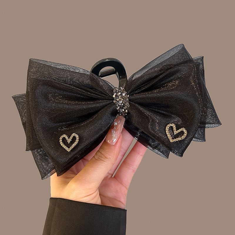 High-end double-sided bow clip, large hair clip for a fleeing princess, shark clip at the back of the head, headwear and hair clip Application Scenario