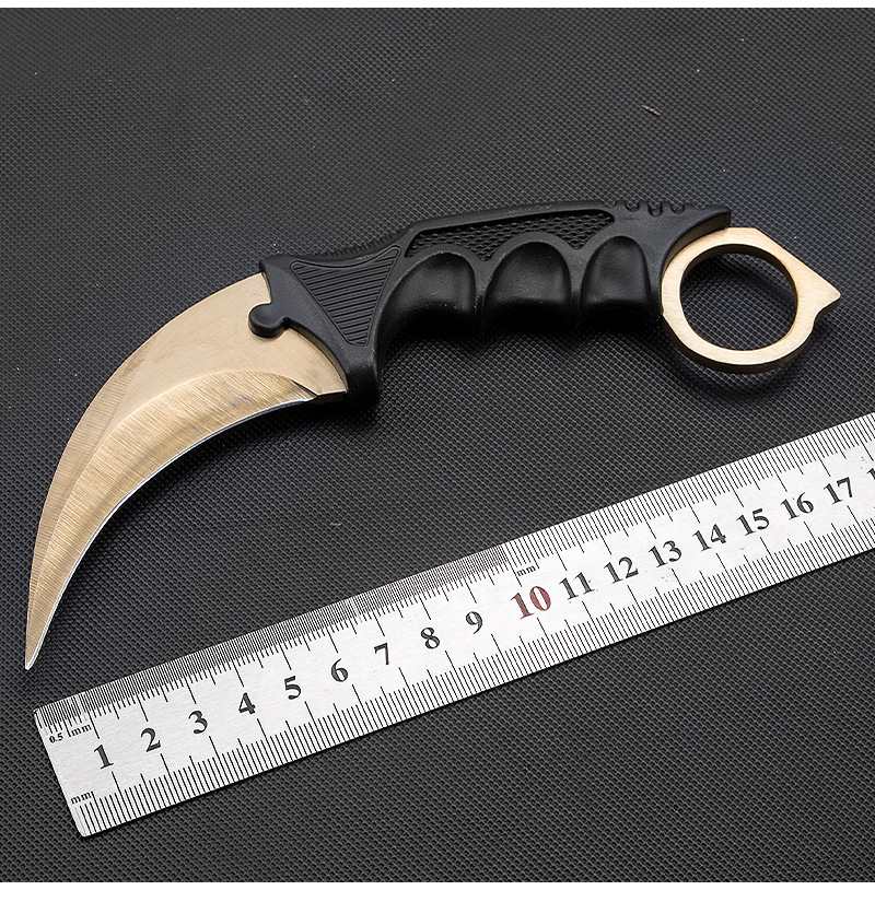 Factory wholesale solid-color claw knives, CSGO game scimitars, high-hardness claw knives, hand motion sharpening tool knives undefined