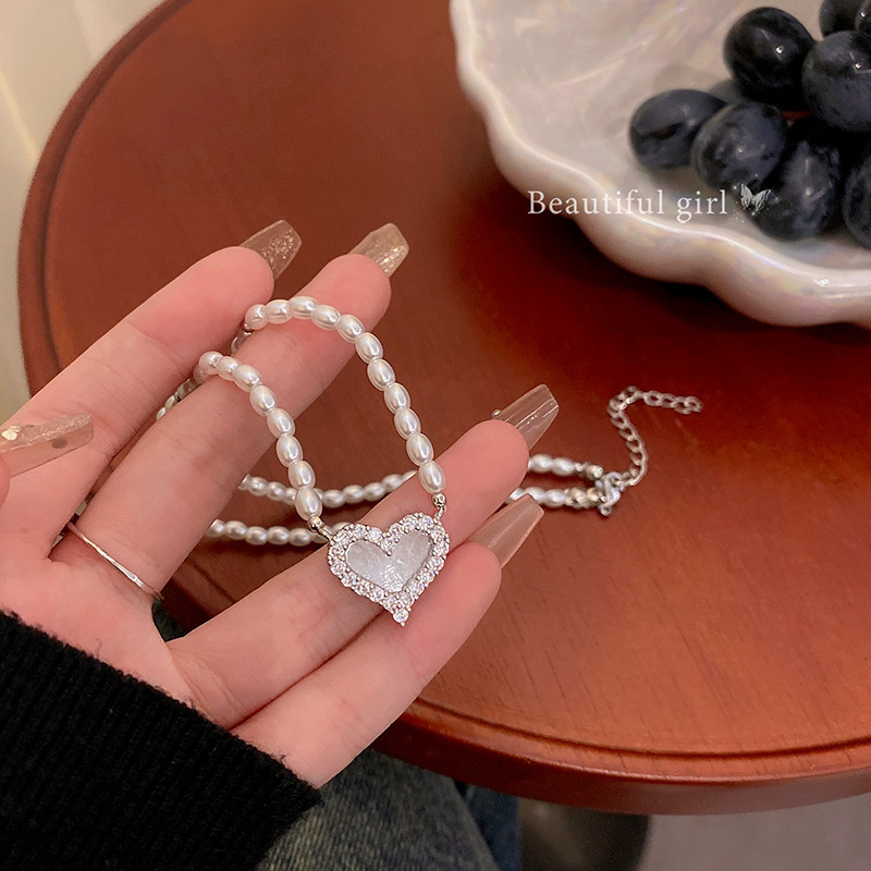 Korean exquisite sparkling diamond heart-shaped pearl necklace, women's light luxury and high-end feel, versatile and personalized collarbone chain necklace accessory details Picture