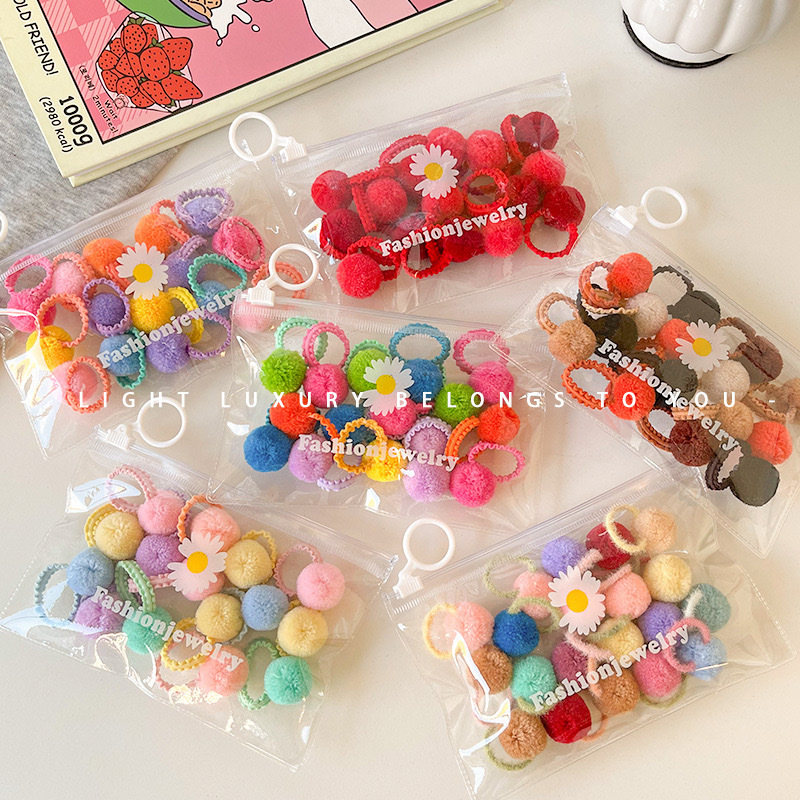 Cute plush hair ties for children in autumn and winter, baby hair ties with elastic bands that won't damage hair, small and colorful pom-pom hair ties full figure
