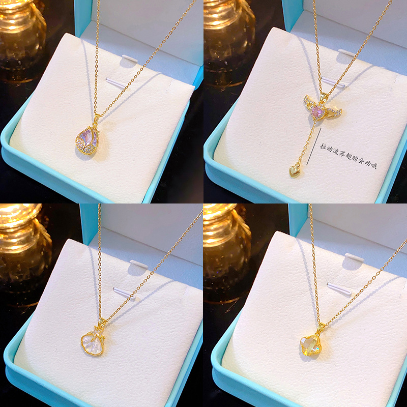 A simple and fashionable titanium steel necklace with genuine gold electroplating for women, a niche and light luxury heart-shaped wing, a popular collarbone chain, and a high-end accessory details Picture