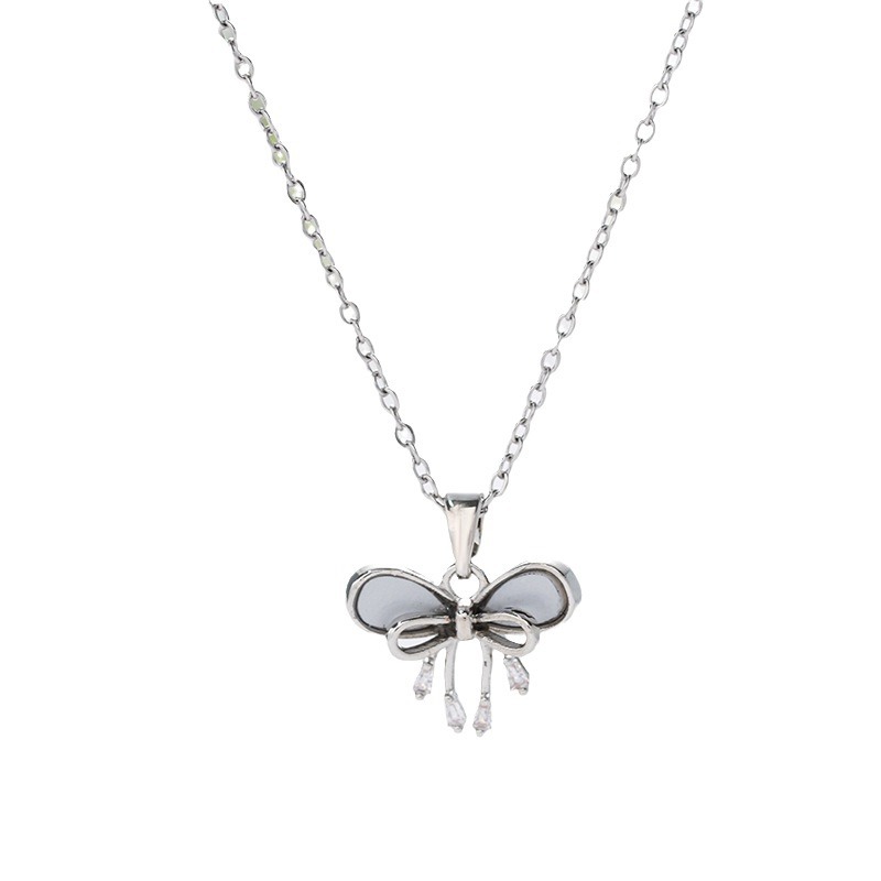 Korean version silver simple bow zircon necklace with a unique design sense for women, titanium steel collarbone chain, elegant and light luxury accessory Item Picture