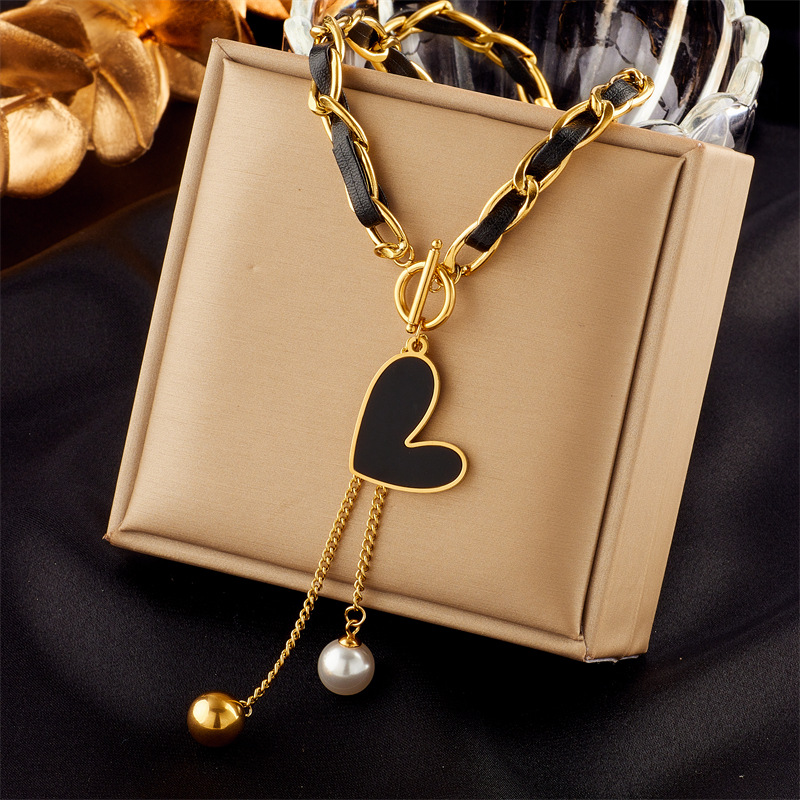 European and American cross-border titanium steel black and gold two-color chain heart-shaped round ball tassel pendant jewelry, cold style necklace full figure