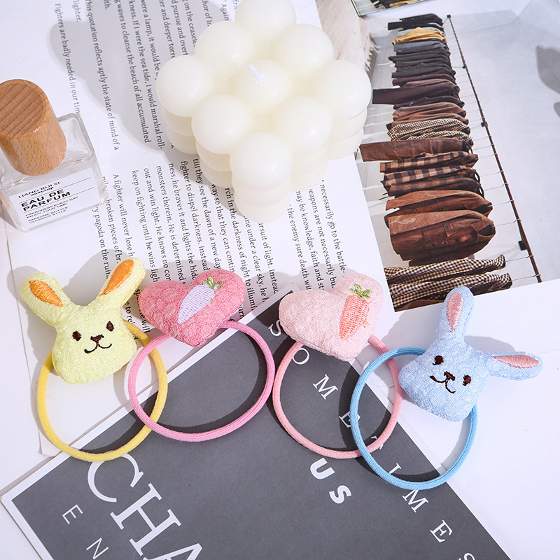 Two cute children's colorful cartoon rabbit hair bands are soft and won't damage hair. Girls can tie their hair in a ponytail in autumn and winter Application Scenario