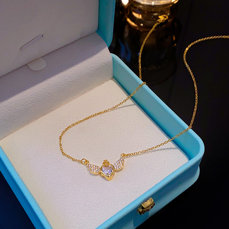 Wholesale of genuine gold electroplated angel wing crown heart-shaped necklace with a unique design sense for women, full diamond wing pendant jewelry Application Scenario