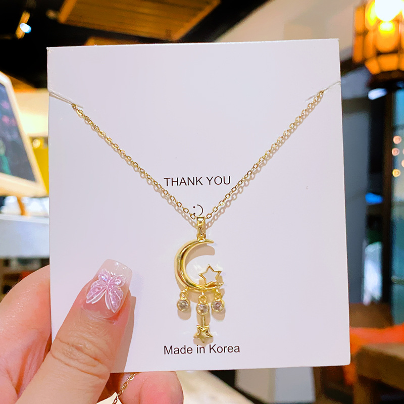 Silver, elegant and high-end tassel, star and moon titanium steel necklace, a unique and light luxury zircon collarbone chain accessory for women details Picture