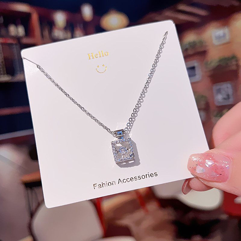Japanese and Korean light luxury dynamic perfume bottle pendant titanium steel necklace, women's niche design sense, popular collarbone chain, versatile accessory details Picture