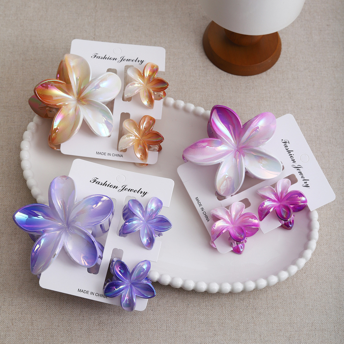 2025 New European and American laser gradient frellia hair clips, colorful scratch-off beach hair accessories, high appearance level wholesale accessories full figure
