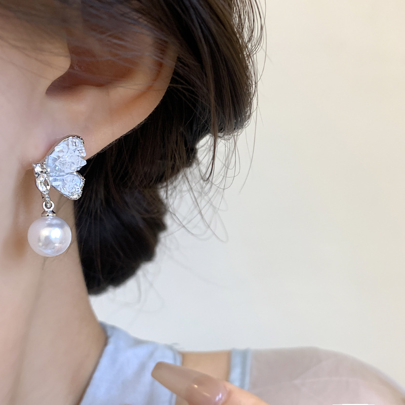 Blue crystal butterfly stud earrings, women's pearl earrings, light luxury and niche design, high-end earrings, 925 silver needle earrings Application Scenario